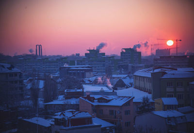 Cityscape against sky at night