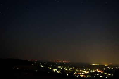 Illuminated cityscape at night