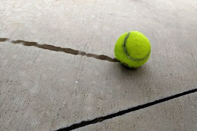 High angle view of tennis ball in court