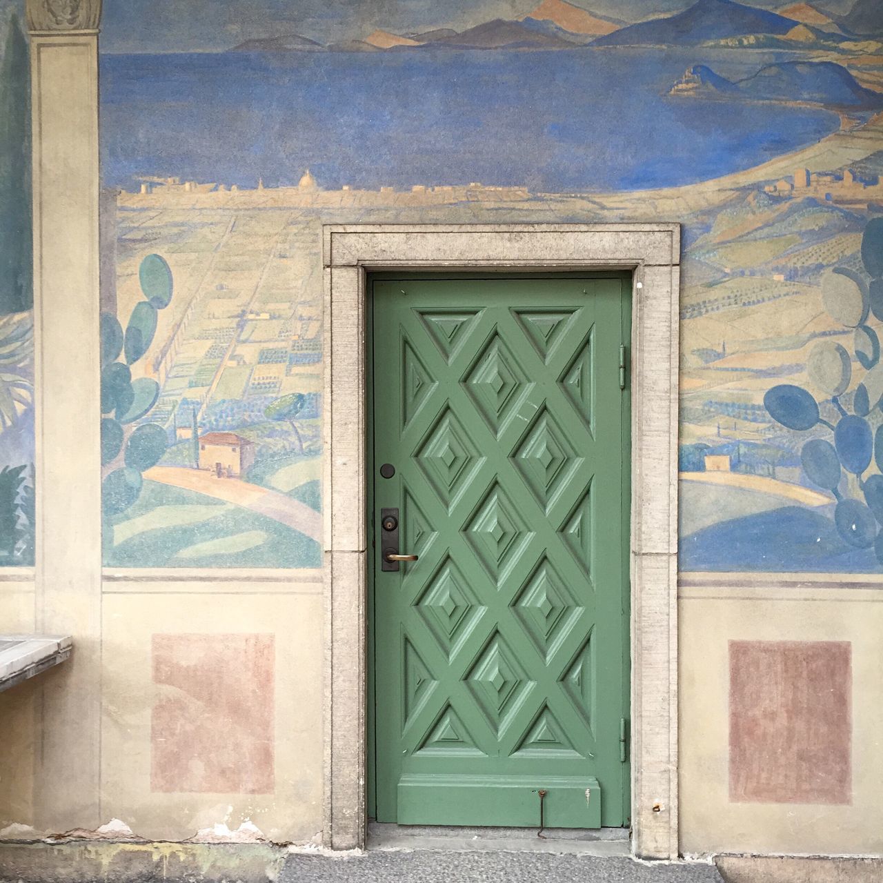 architecture, built structure, building exterior, window, wall - building feature, door, wall, closed, building, pattern, house, blue, day, brick wall, no people, art and craft, outdoors, design, entrance, old