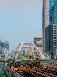 Modern buildings against sky in city