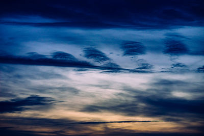 Low angle view of dramatic sky during sunset