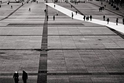 People walking in airport runway