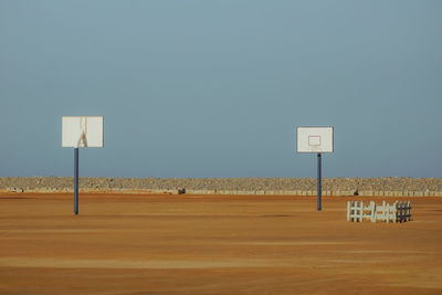 View of basketball hoop against clear sky