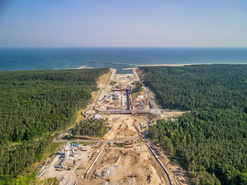 High angle view of castle on sea shore against sky