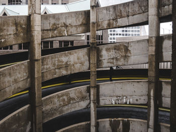 Parking garage seen through fence