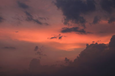 Low angle view of dramatic sky during sunset