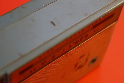 Close-up of red text on metal