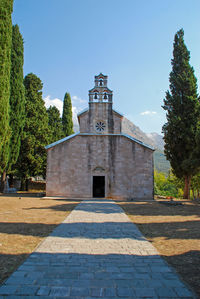 Exterior of temple against clear sky