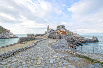 View of historical building against cloudy sky