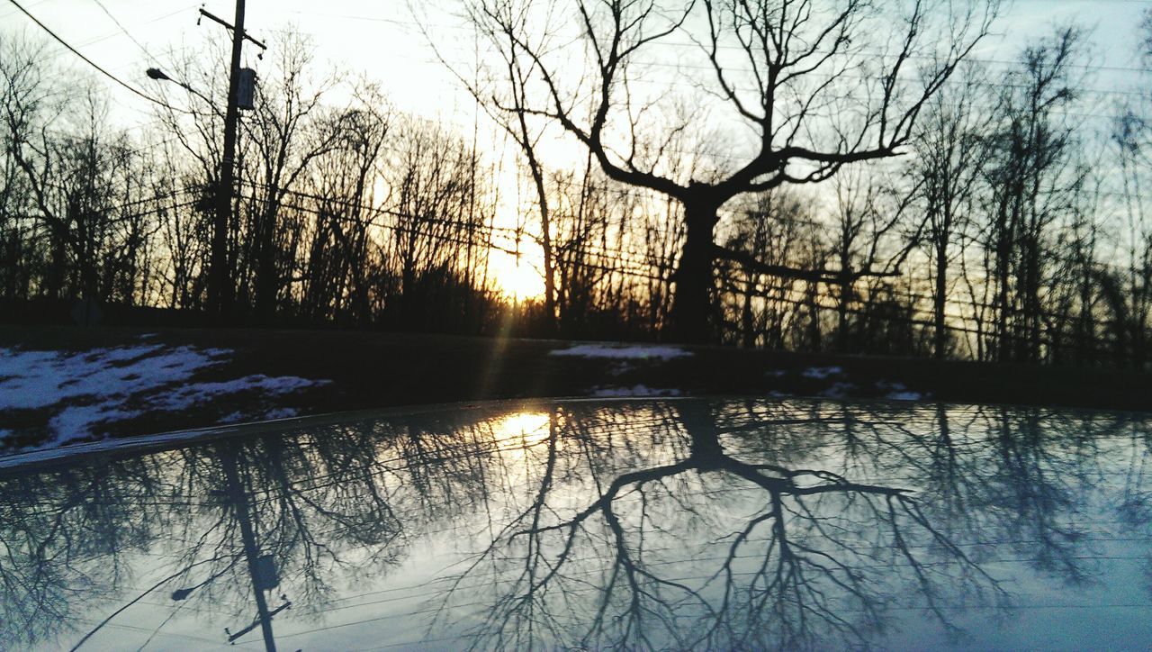 bare tree, tree, sun, sunset, tranquility, tranquil scene, winter, cold temperature, branch, snow, water, scenics, beauty in nature, reflection, lake, nature, silhouette, sunlight, sky, river