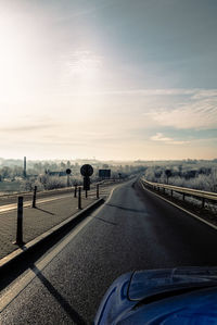 Road in city against sky