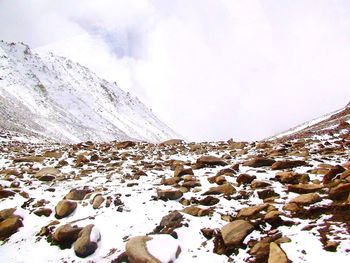 Scenic view of snow covered mountains