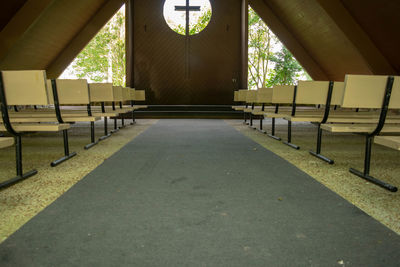 Empty benches in building
