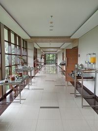 Empty chairs and tables in building