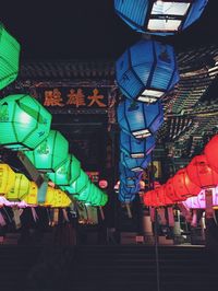 Illuminated lanterns hanging at night