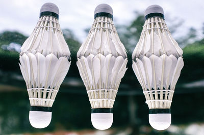 Close-up of shuttlecocks on table