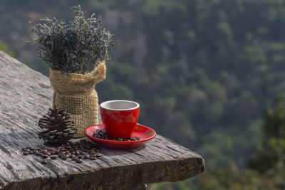 Close-up of red wine and coffee on table