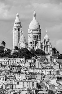 Basilique du sacre coeur in cityscape against sky