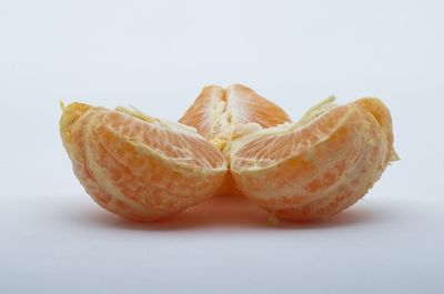 Close-up of orange against white background