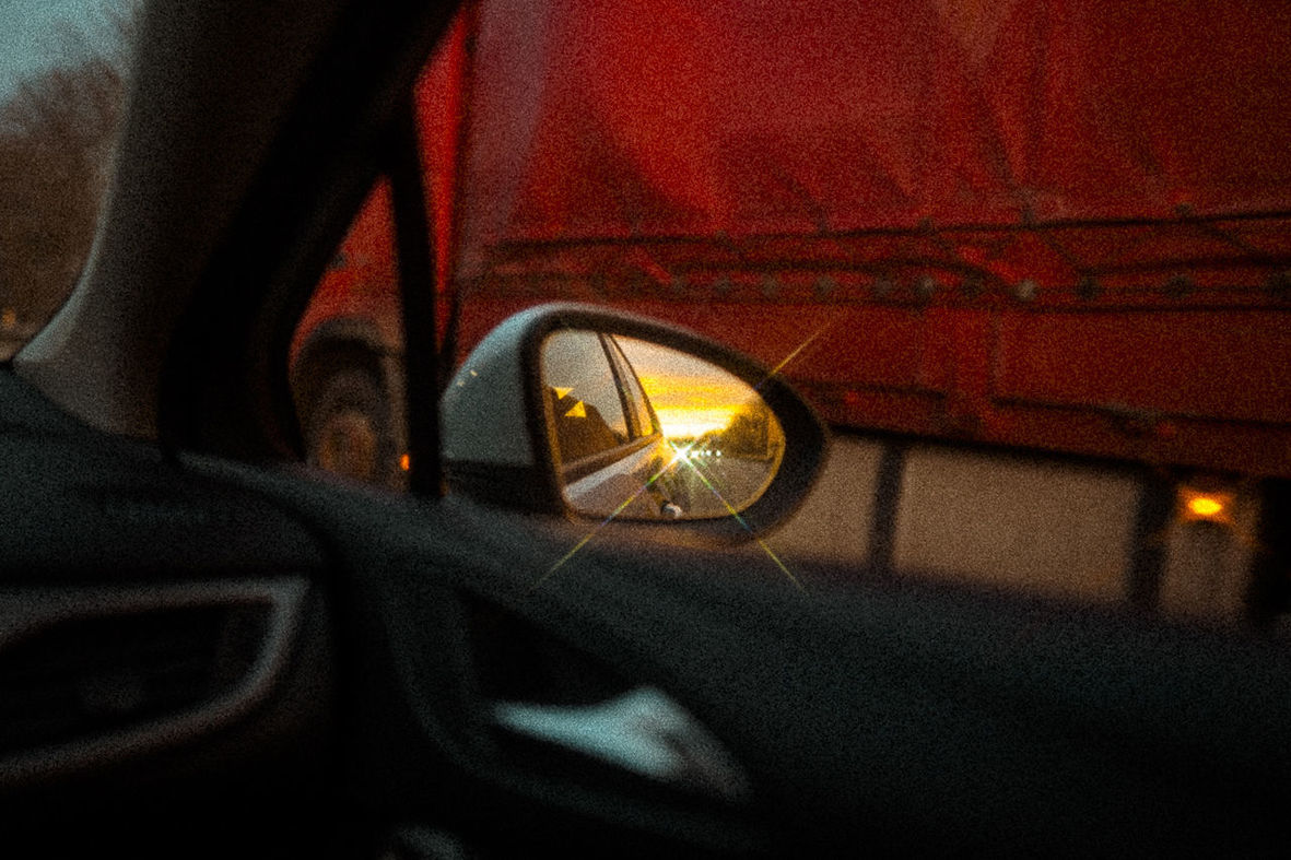 CLOSE-UP OF ILLUMINATED CAR