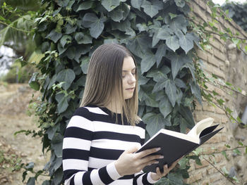 Young woman using mobile phone