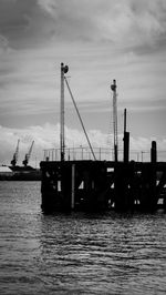 Boats moored at harbor