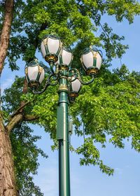 Low angle view of street light against sky