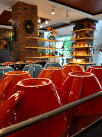 Empty chairs and tables in restaurant