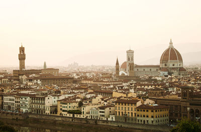 Cityscape view of palazzo vecchio and cathedral of santa maria del fiore, florence, italy.