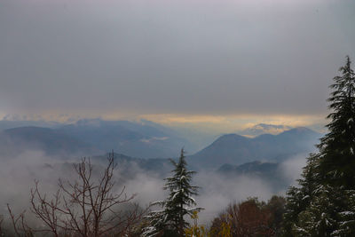 Scenic view of mountains against sky during sunset