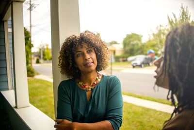 Smiling woman looking away