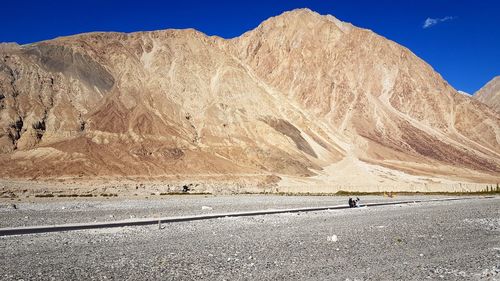 Scenic view of desert against clear sky