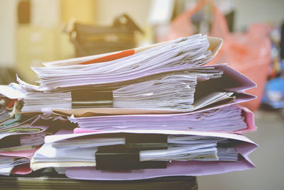 Close-up of files on table at office