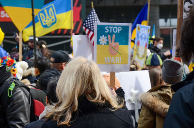 Rear view of people on street