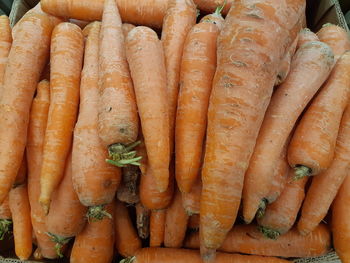 High angle view of carrots for sale at market stall