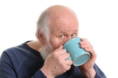 Portrait of man drinking coffee