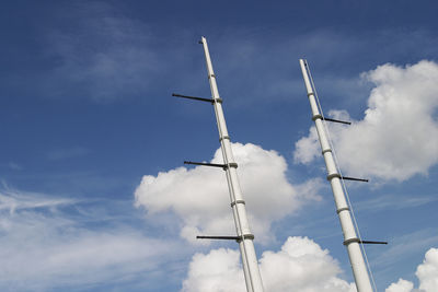 Low angle view of windmill against sky