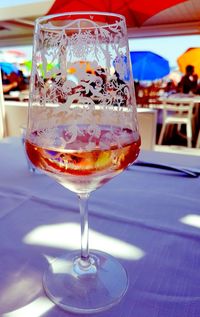 Close-up of wineglass on table