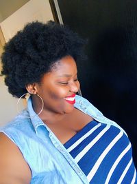 Close-up of young woman smiling