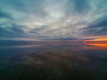 Scenic view of dramatic sky over sea