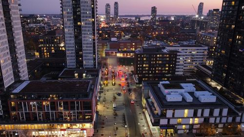 High angle view of illuminated buildings at night