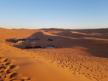 Scenic view of desert against clear sky