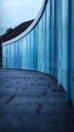 Close-up of blue doors on beach building