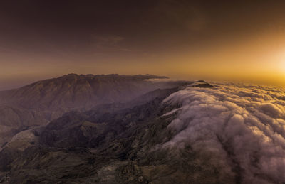 Scenic view of mountains against sky during sunset