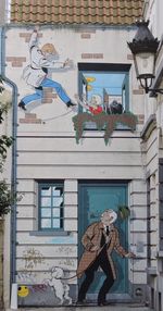 Woman with umbrella in city