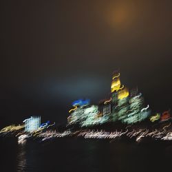 View of illuminated buildings at night