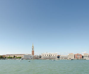 View of buildings against cloudy sky