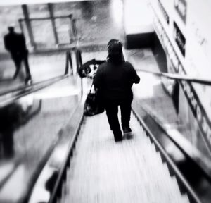 Blurred motion of people walking in subway