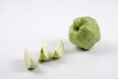 High angle view of fruits against white background